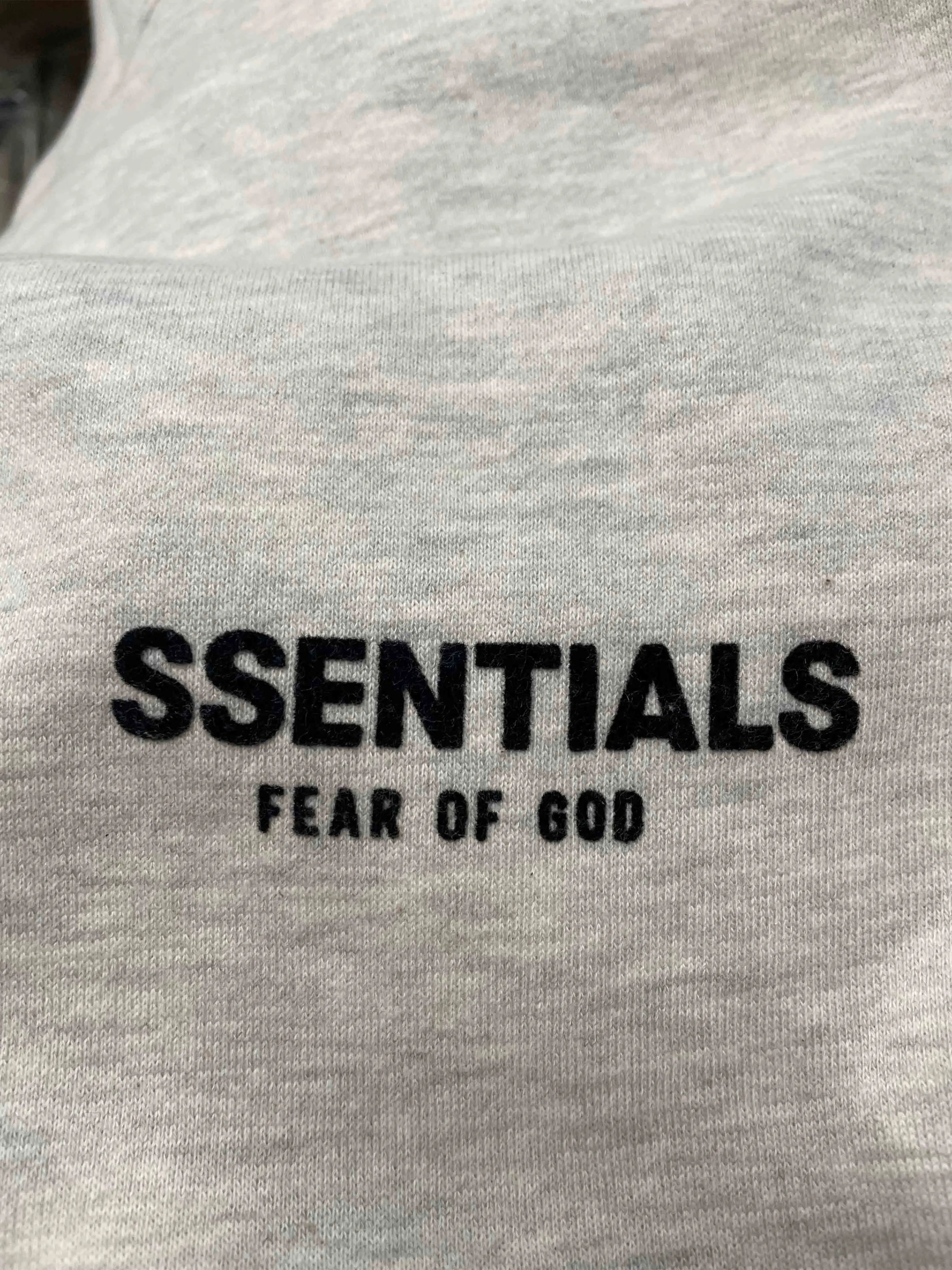 Image of Fear of God Essentials Hoodie Light Oatmeal [SS22] [FACTORY FLAW] Prior