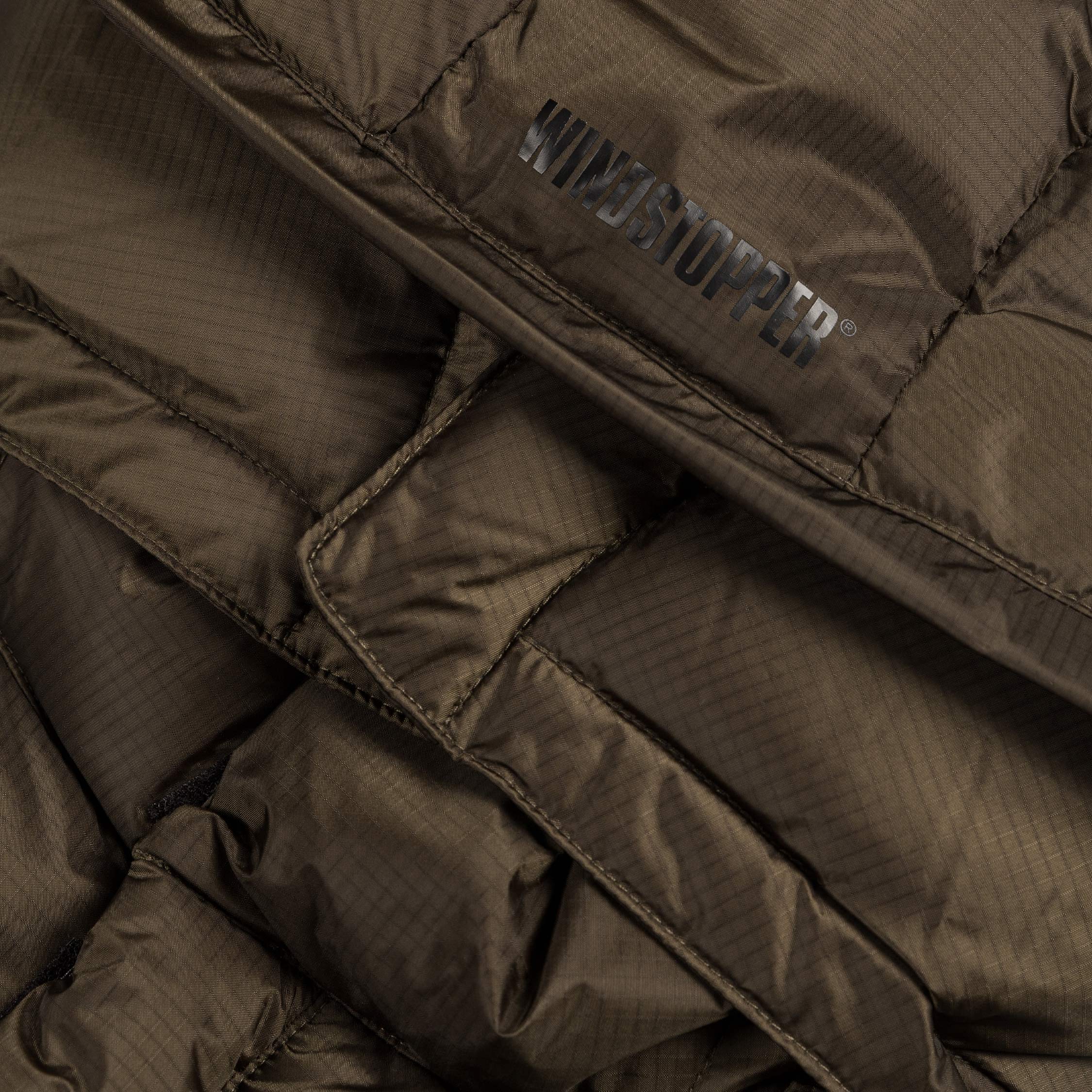 Image of thisisneverthat	*Gore-Tex Windstopper* Down Puffer Jacket