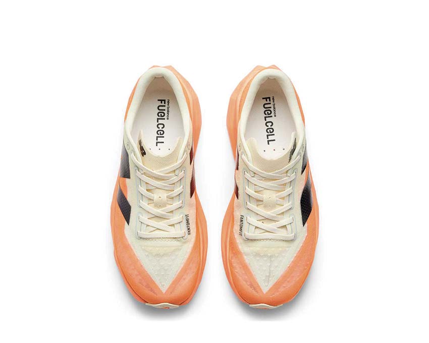 Image of New Balance FuelCell Rebel V4 Hot Mango / Angora MFCXCO4