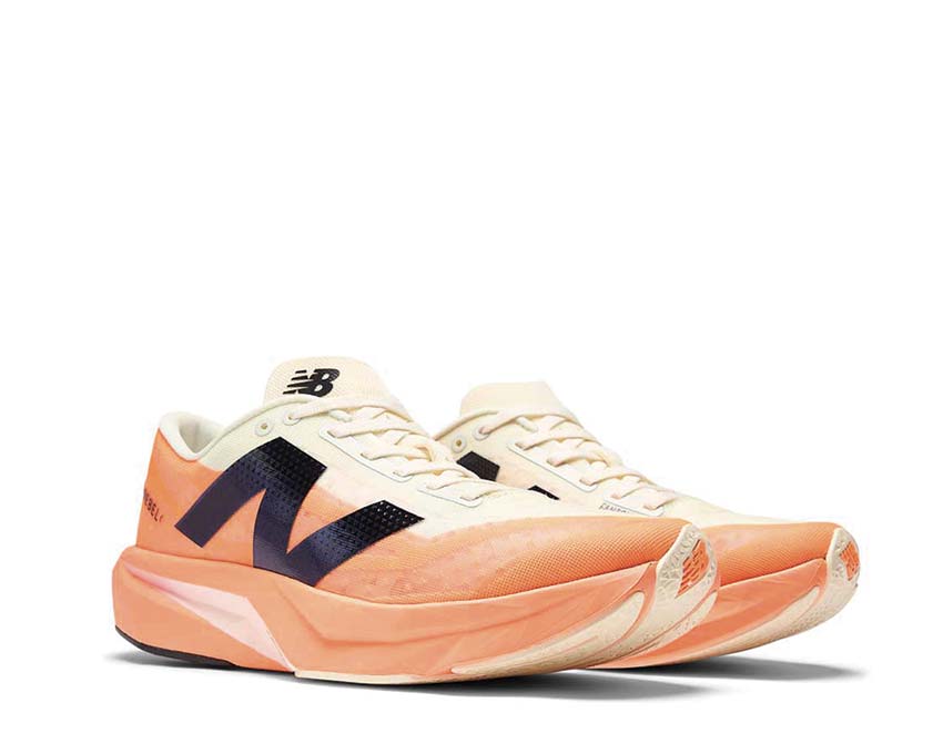 Image of New Balance FuelCell Rebel V4 Hot Mango / Angora WFCXCC4
