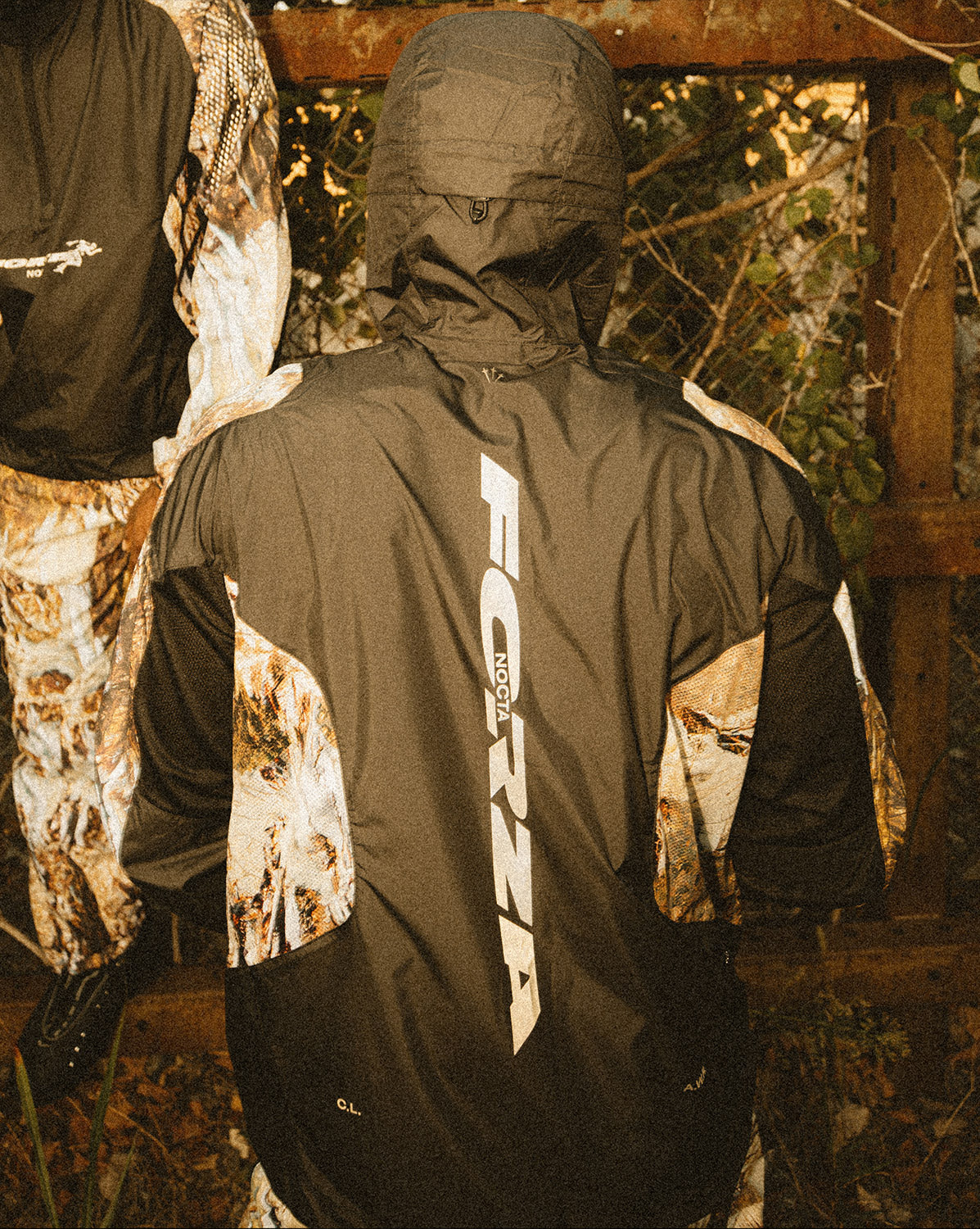 Image of Nike x NOCTA Run Halfzip Hooded Jacket onfeet