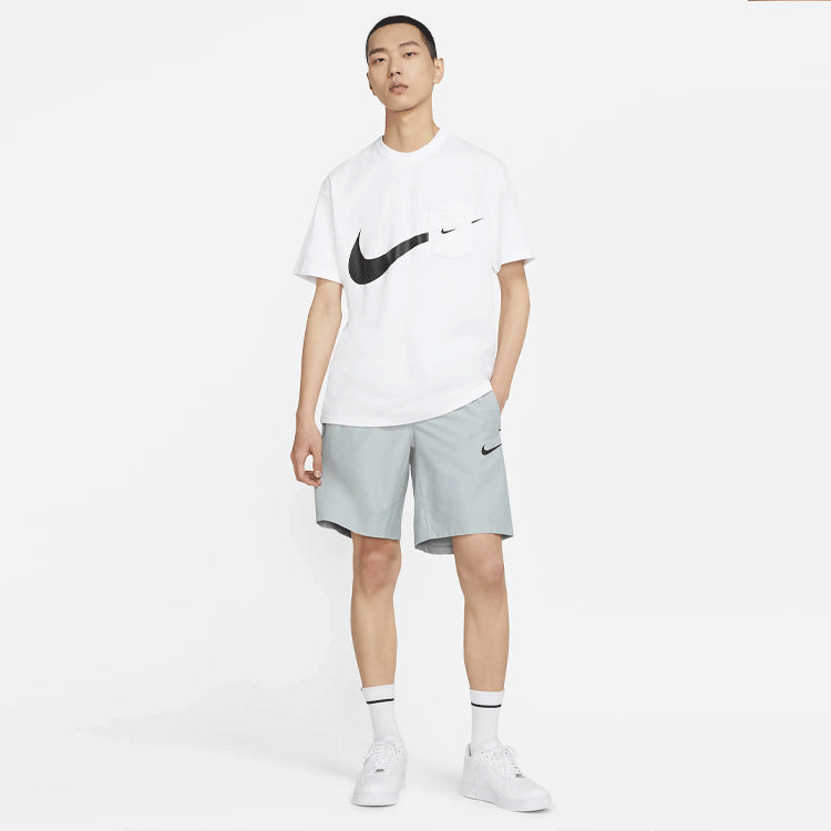 Image of شورت رياضي بشعار Nike Sportswear Tech Pack باللون الرمادي CZ9573-019