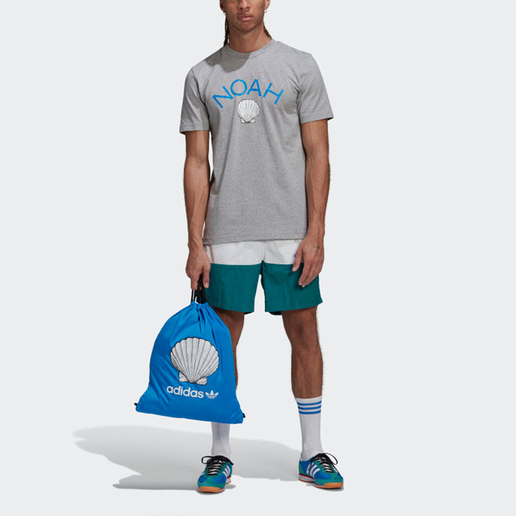 Image of adidas originals x NOAH Shell Logo Trunks 'White Green' GE1259