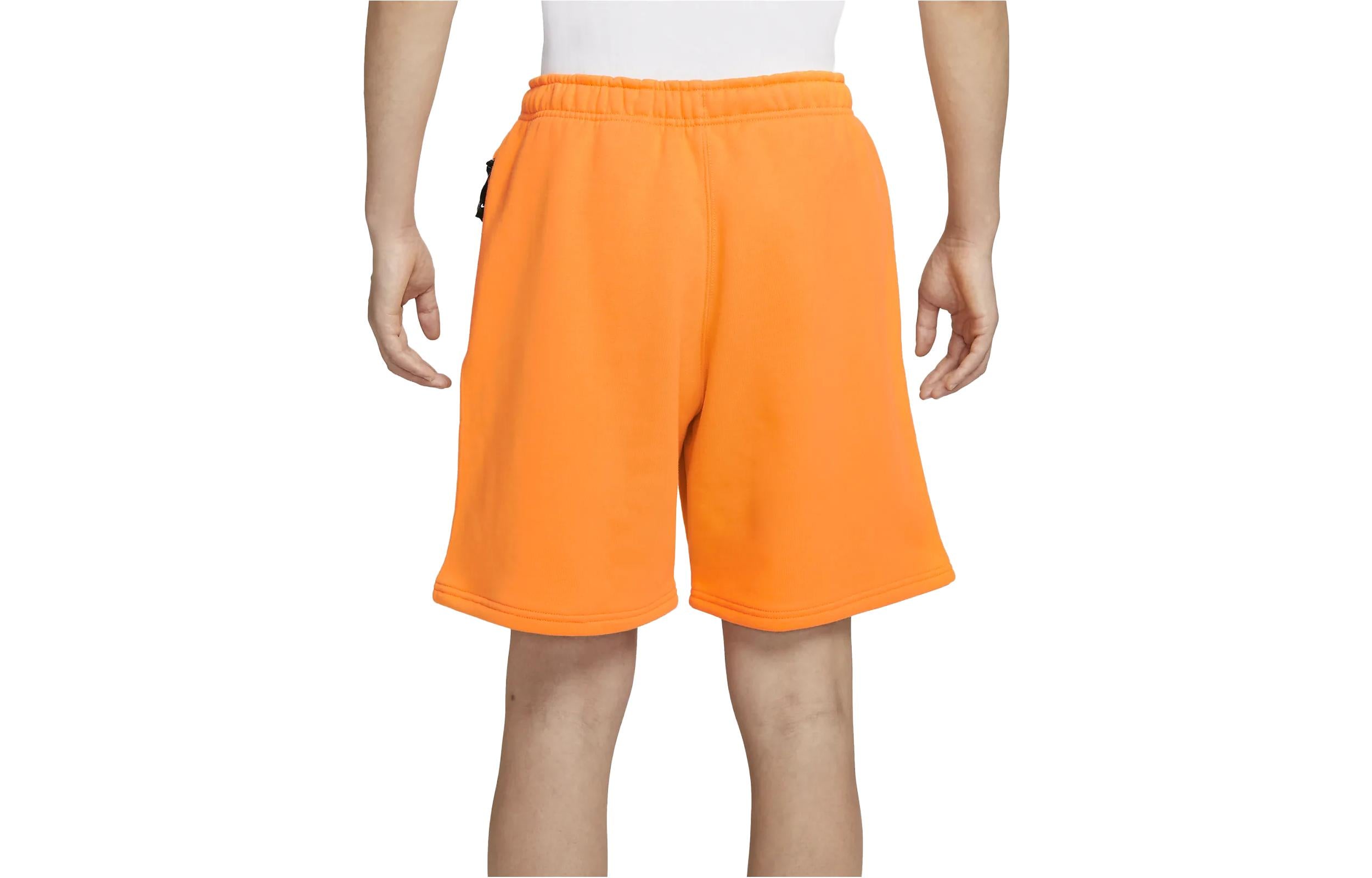 Image of شورت Nike Solo Swoosh Fleece باللون البرتقالي DV3056-836