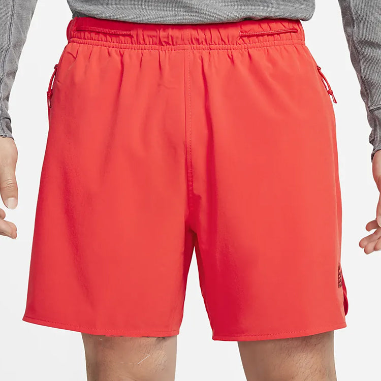 Image of شورت Nike ACG DF New Suns باللون البرتقالي والأحمر DN3956-696