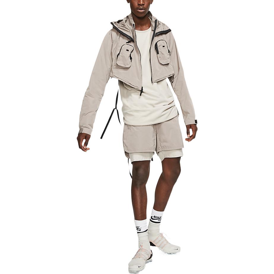 Image of Men's Nike A.A.E. Elastic Waist Solid Color Multiple Pockets Shorts Stone Brown