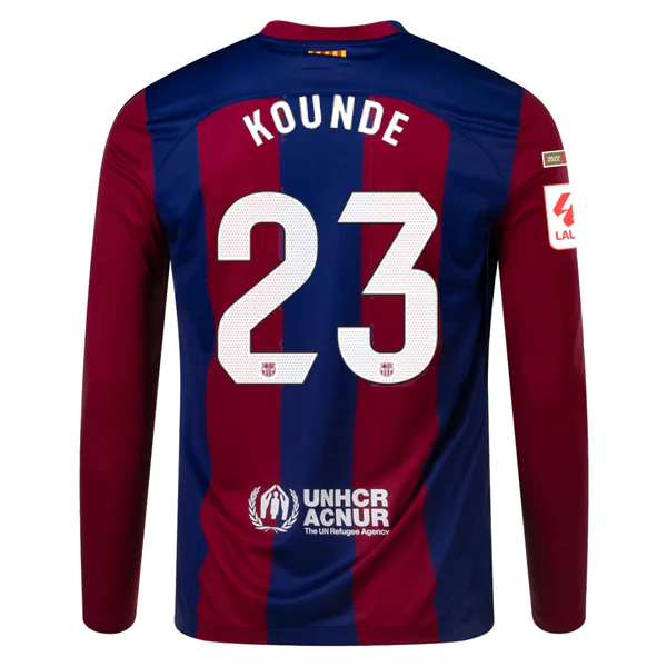 Image of Nike Barcelona Jules Kounde Home Long Sleeve Jersey 23/24 w/ La Liga Champions P