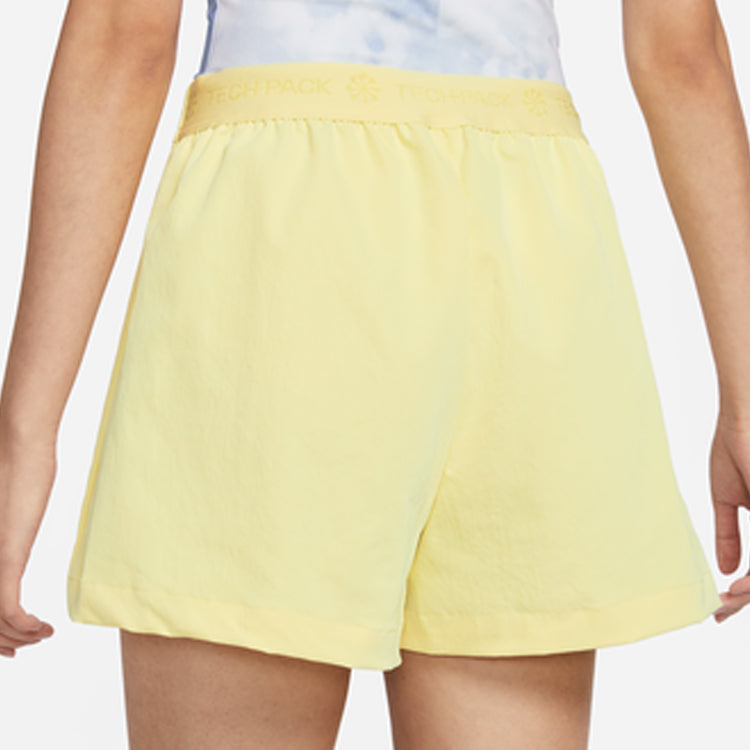 Image of (WMNS) Nike Sportswear Tech Pack Hochsitzender Skort 'Lemon Chiffon Alabaster' DV849