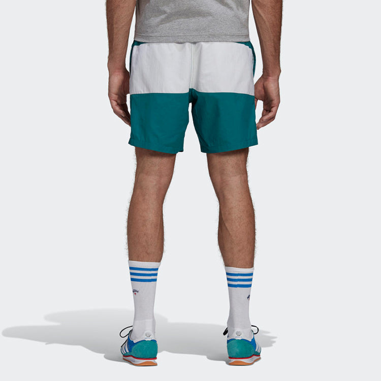Image of adidas originals x NOAH Shell Logo Trunks 'White Green' GE1259