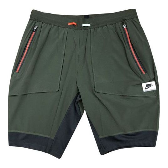Image of Nike Hybrid Splicing Schnelltrocknende, atmungsaktive Sportshorts für Herren Grün BV5587-355