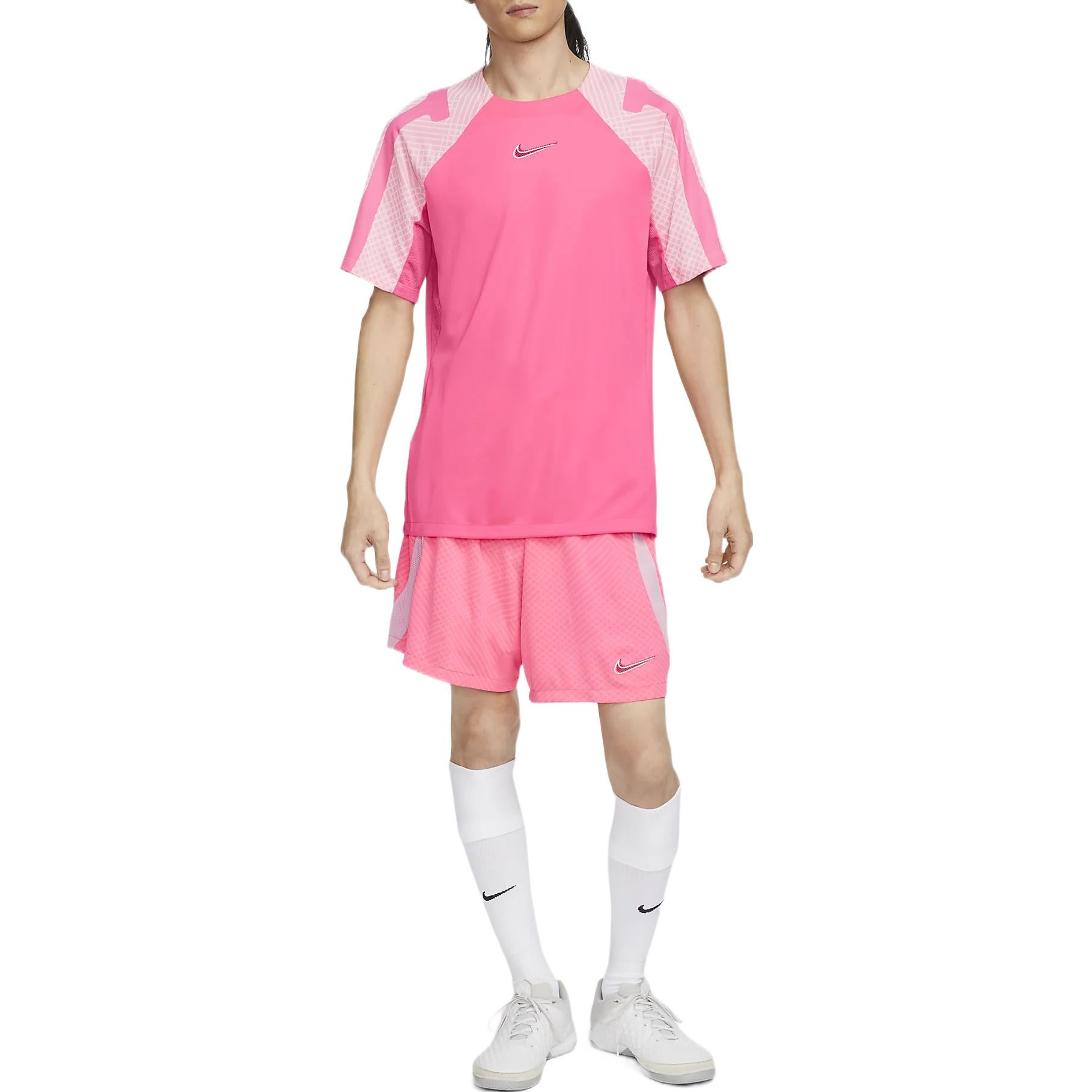Image of شورت كرة القدم Nike Dri-FIT Strike باللون الوردي DH8777-639