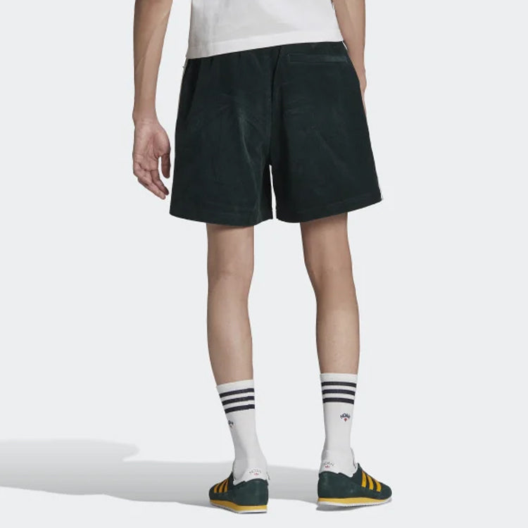 Image of شورت كاجوال من adidas originals x NOAH Crossover Corduroy Side Stripe باللون الأخضر HC430