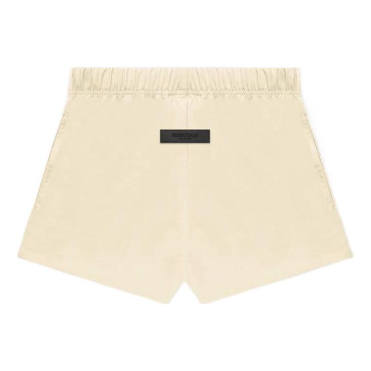 Image of Fear of God Essentials FW22 Nylon Running Shorts Egg Shell FOG-FW22-0792