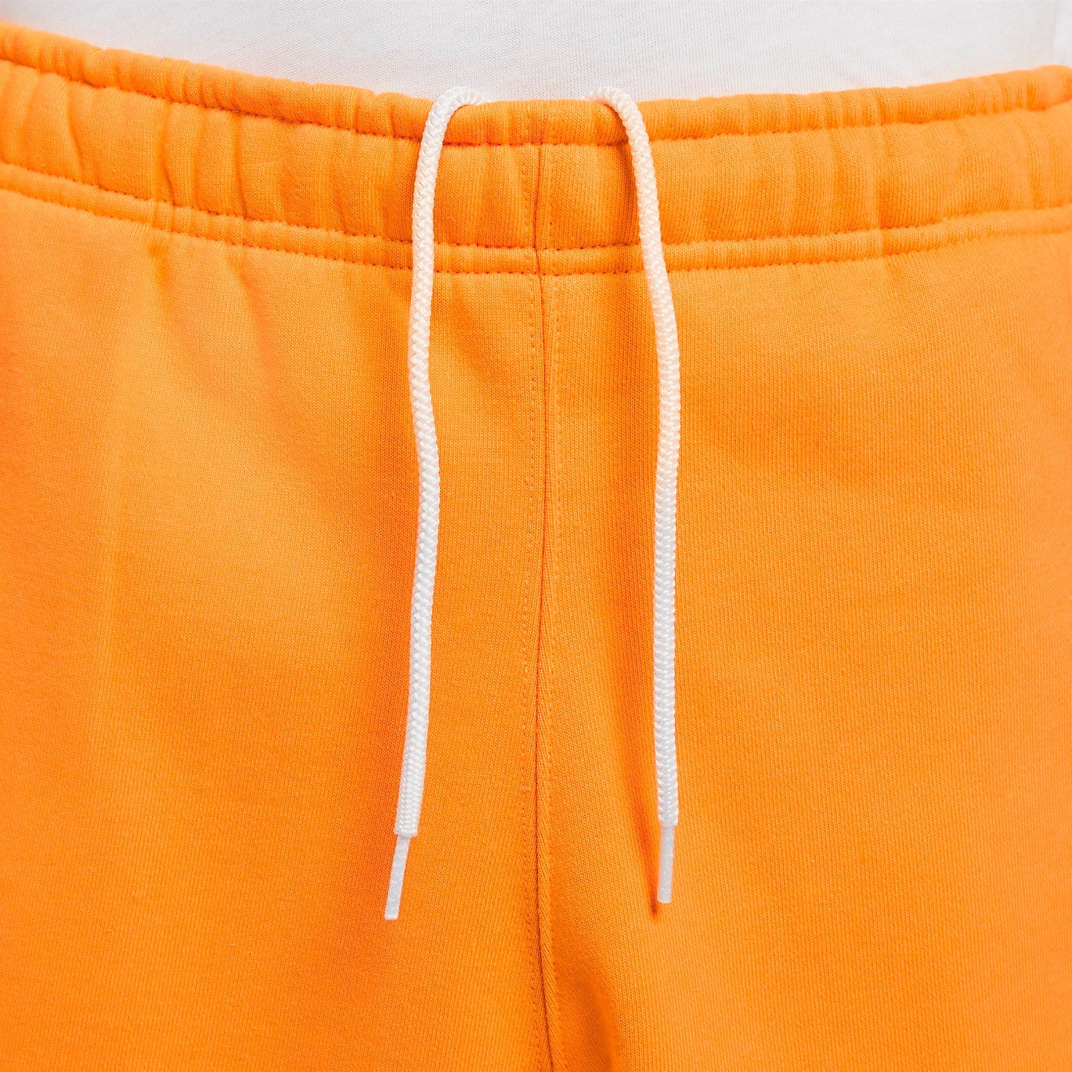 Image of شورت Nike Solo Swoosh Fleece باللون البرتقالي DV3056-836