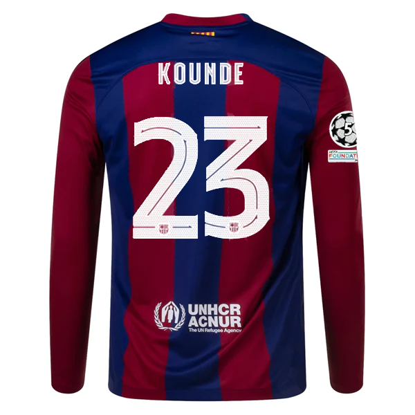 Image of Nike Barcelona Home Jules Kounde Long Sleeve Jersey w/ Champions League Patches