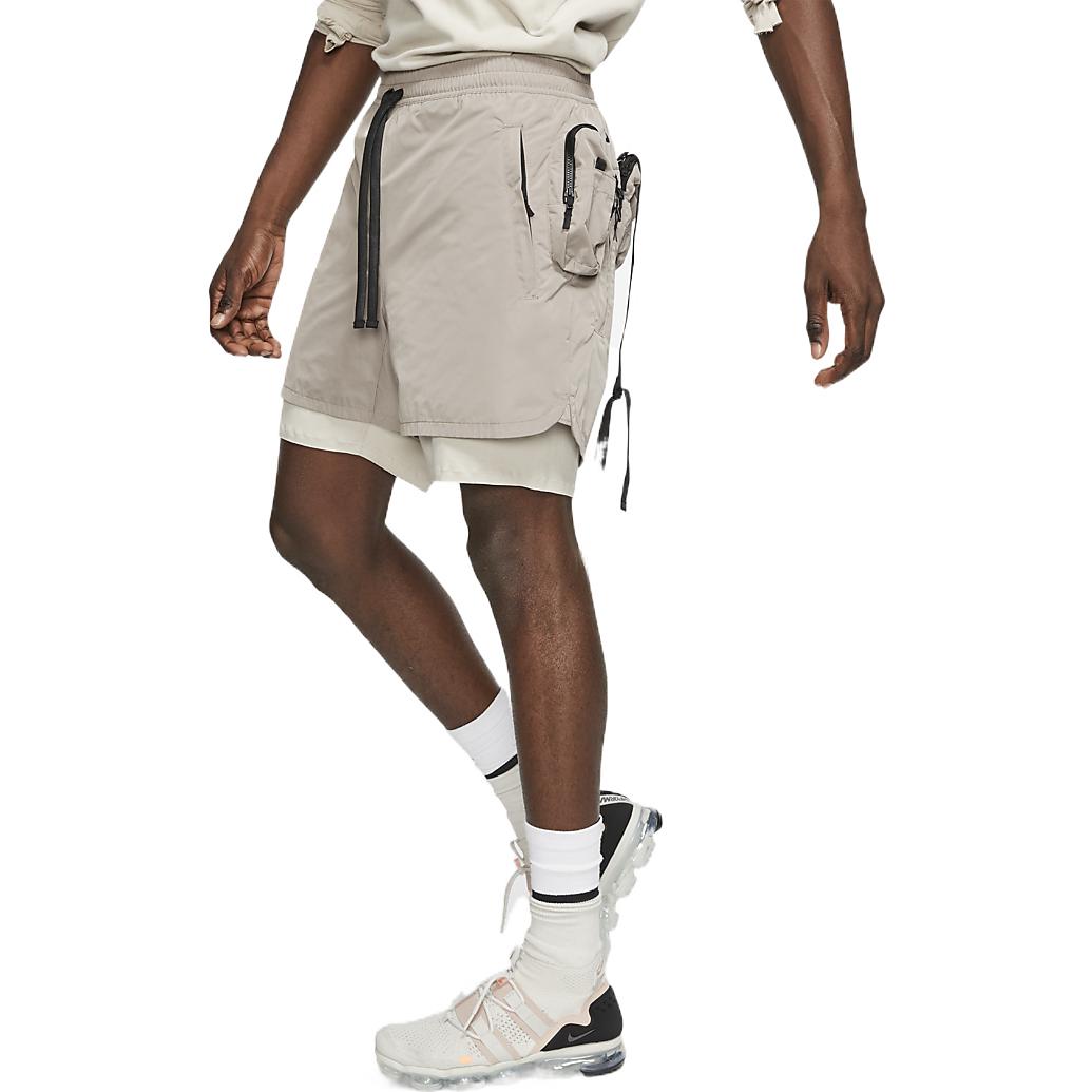 Image of Men's Nike A.A.E. Elastic Waist Solid Color Multiple Pockets Shorts Stone Brown