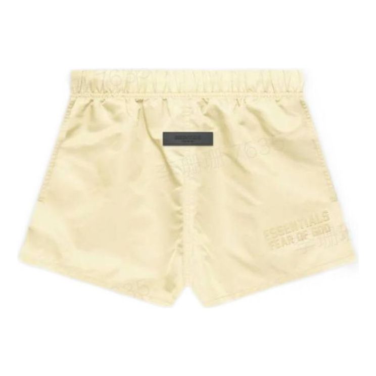 Image of Fear of God Essentials FW22 Running Shorts Canary FOG-FW22-557