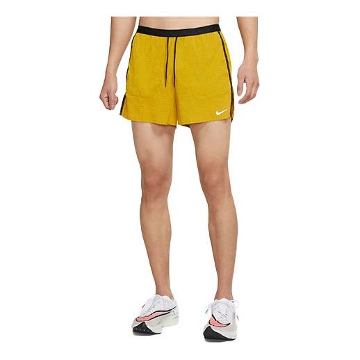 شورت رياضي للجري قابل للتنفس من Nike Stride Run Division باللون الأخضر DA1301-392