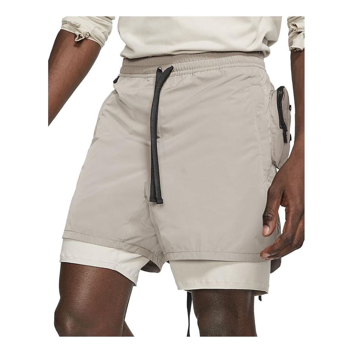 Image of Men's Nike A.A.E. Elastic Waist Solid Color Multiple Pockets Shorts Stone Brown
