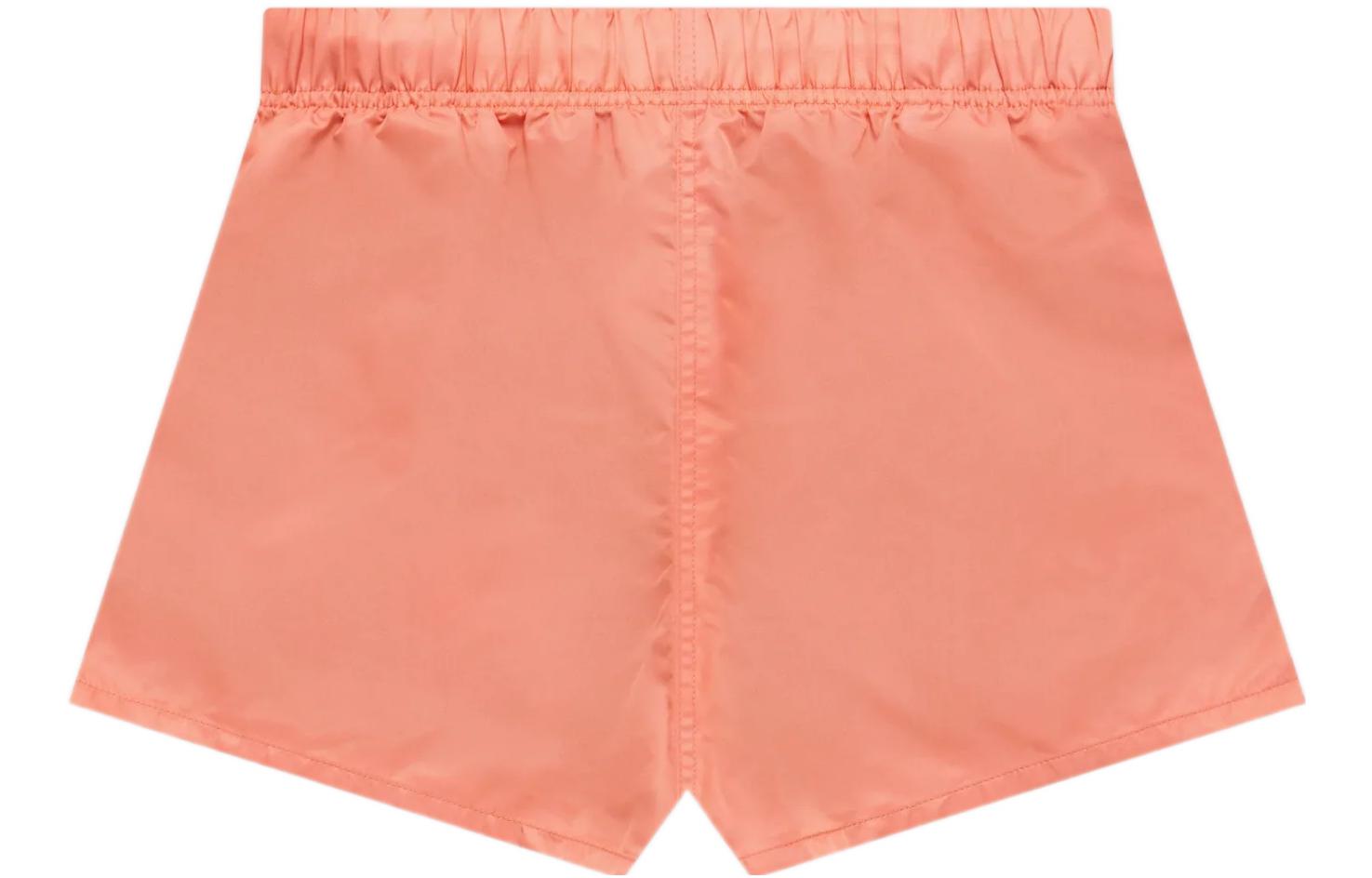 Image of Fear of God Essentials FW22 Nylon Running Shorts Coral FOG-SS22-589