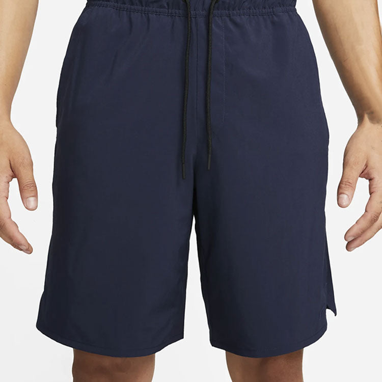 Image of Nike Dri-FIT Unlimited 9' Unlined Versatile Shorts DV9330-451