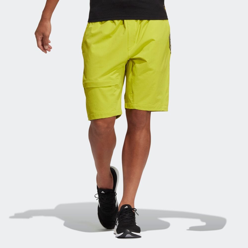 Image of Men's adidas Solid Color Belt Straight Casual Sports Shorts Yellow HE9933