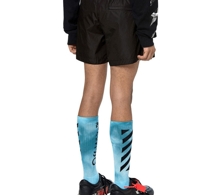 Image of OFF-WHITE Straßenshorts aus Gummi mit Logo Schwarz OMFA003S20A230211001