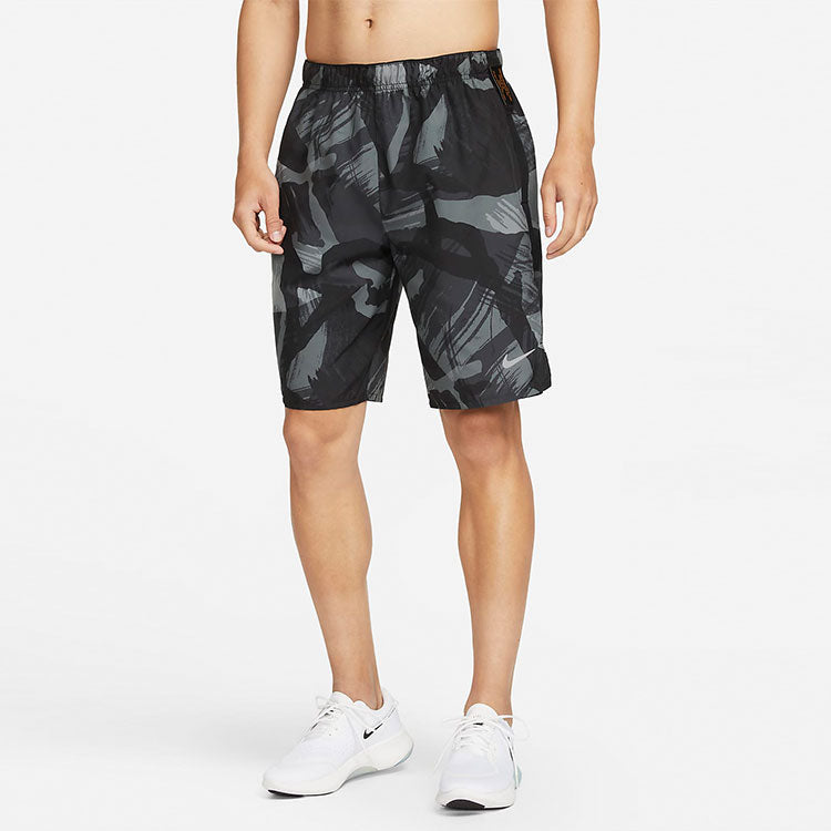 Image of Nike Dri-FIT Challenger 9 Zoll ungefütterte, vielseitige Shorts DV9371-010